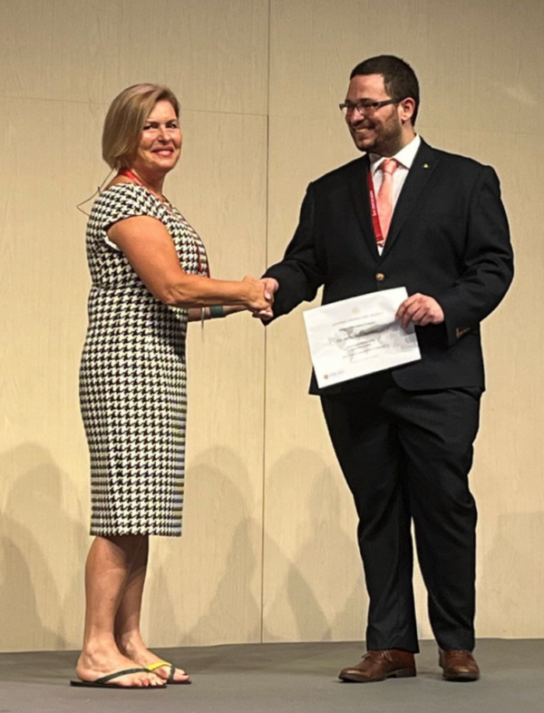 Dr Mina Gaga, Alternate Minister of Health in Greece and Previous President of the ERS (left) presents the ERS Early Career Member Award to Dr Alexander Mathioudakis