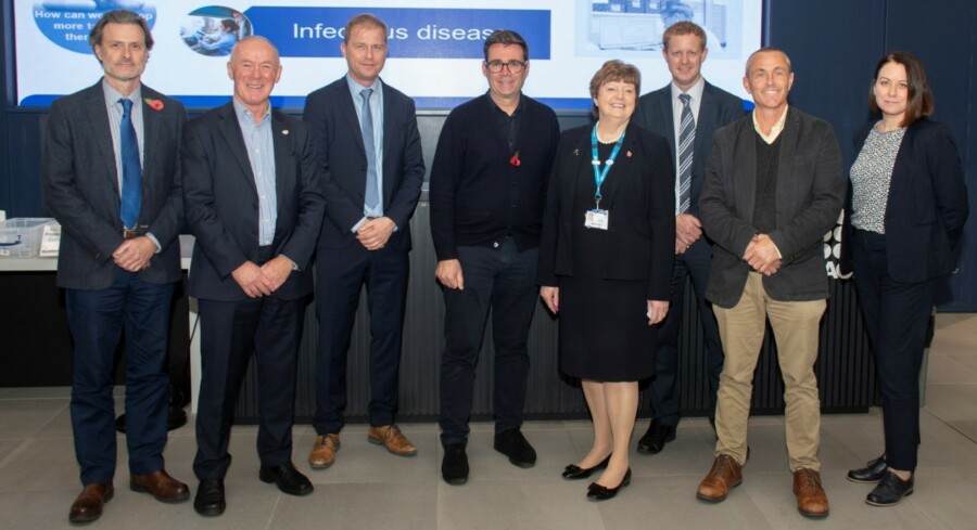 Dr Iain McLean, Managing Director for Research and Innovation at MFT, Richard Leese; Chair NHS GM Integrated Care Board, Kai te Kaat; Vice President, QIAGEN, Andy Burnham; Mayor of Greater Manchester, Kathy Cowell OBE DL; Group Chairman of MFT, Professor Rick Body; Group Director of Research and Innovation at MFT and Manchester BRC Innovation and Partnerships Lead, Professor Neil Hanley; Vice-Dean covering Research and Innovation in the Faculty of Biology, Medicine and Health at The University of Manchester, Dr Katherine Boylan, Head of Innovation at MFT.