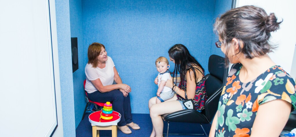 Researcher Jo Brooks with Mum Marsha Johnson and baby Logan, with Anisa Visram looking on